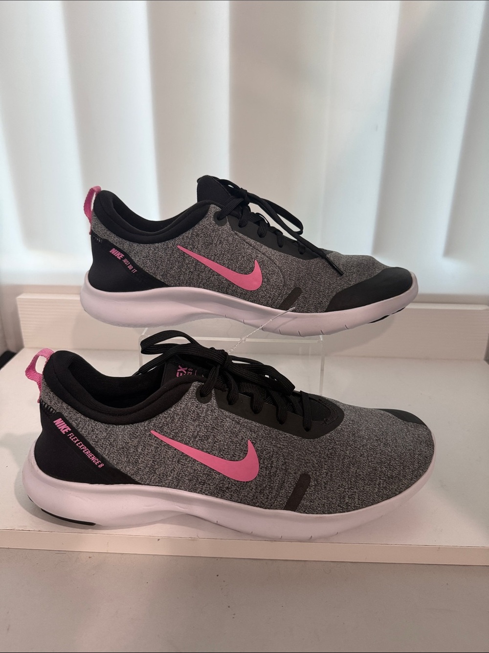 Nike Women's Gray Athletic Sneakers with Pink Swoosh